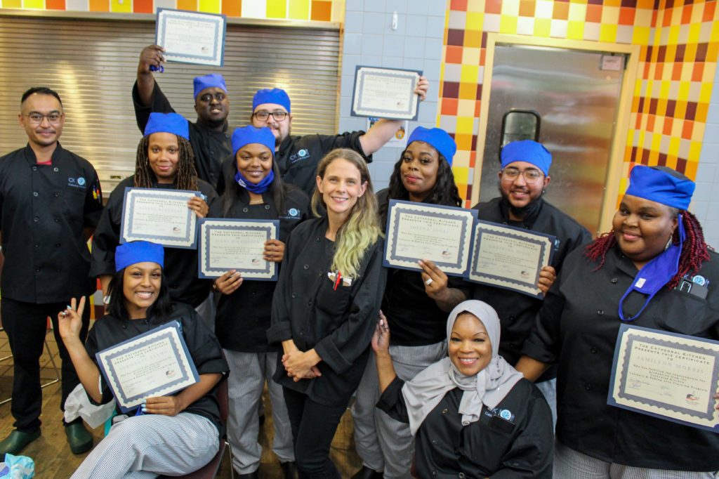 Cathedral Kitchen culinary arts grads with diplomas