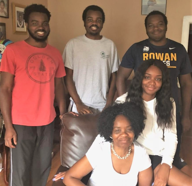 home snapshot of four Obasi siblings and their mom