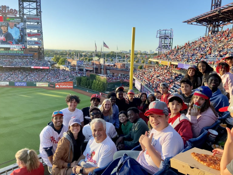 group shot of Domenica Scholars with Pepe and Elena Piperno at a Phillies game