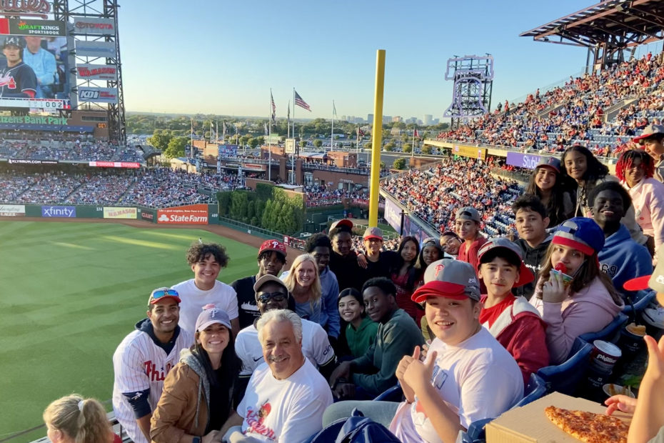 group shot of Domenica Scholars with Pepe and Elena Piperno at a Phillies game