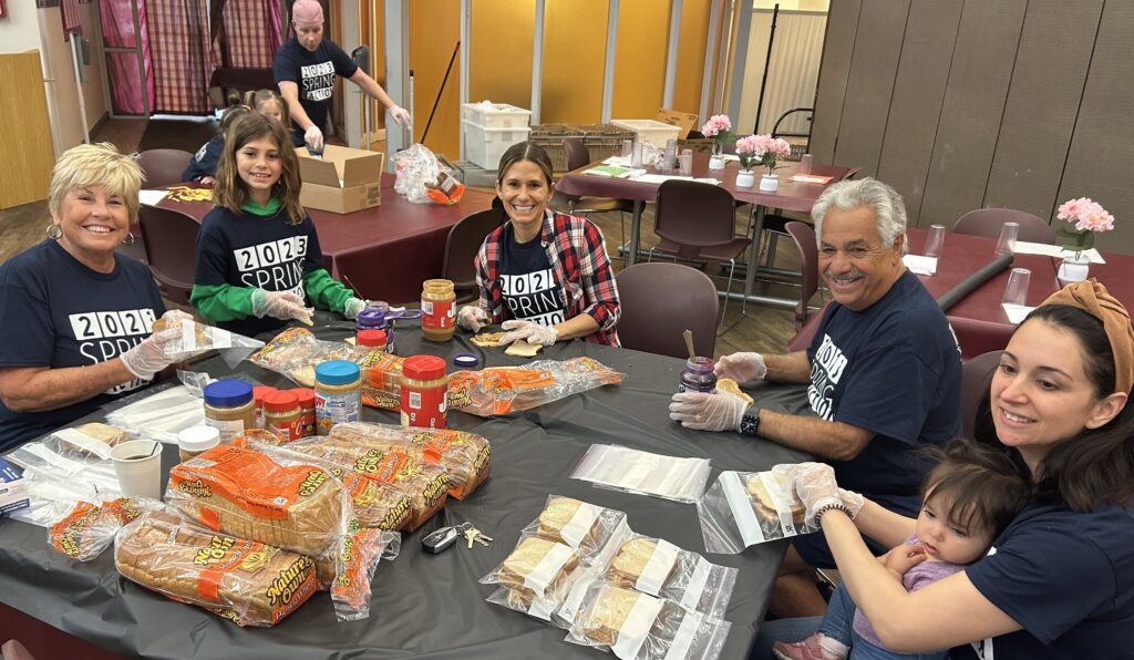 photo of volunteers making sandwiches