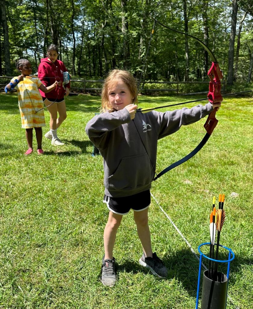 girl practicing archery