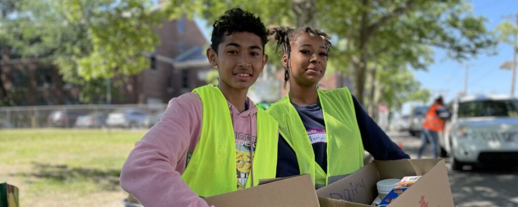 Teens helping with food distribution